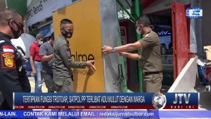 BERITA VIDEO : TERTIPKAN FUNGSI TROTOAR, SATPOL PP TERLIBAT ADU MULUT DENGAN WARGA
