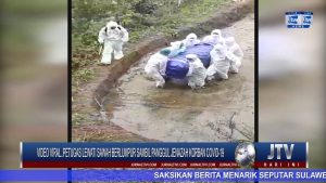 VIDEO VIRAL..TIM PEMAKAMAN JENAZAH COVID-19 LEWATI MEDAN BERLUMPUR SAMBIL PANGGUL PETI JENAZAH